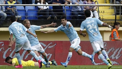 Celta Vigo forward Nolito, second right, celebrates his goal against Villarreal with teammates. Jose Jordan / AFP