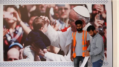 Last minute preparations at Sacred Heart Catholic Church in Manama.