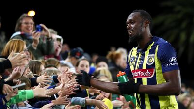 Usain Bolt greets during a pre-season friendly for Central Coast Mariners. Getty Images