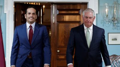 US secretary of state Rex Tillerson walks with Qatari foreign minister Sheikh Mohammed bin Abdulrahman Al Thani before their meeting at the state department in Washington on June 27, 2017. Yuri Gripas / Reuters