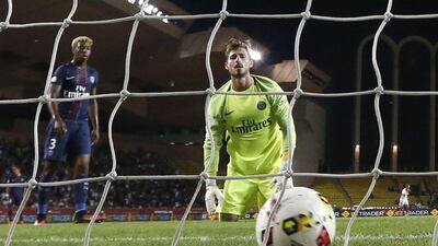 Paris Saint-Germain goalkeeper Kevin Trapp looks on after Monaco's Fabinho (not shown) scores. Valery Hache / AFP