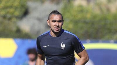 France’s Dimitri Payet warms up a training session at the Centre Robert Louis Dreyfus, in Marseille, southern France, Wednesday, July 6, 2016. France will face Germany in a Euro 2016 semi-final match in Marseille on Thursday, July 7, 2016. Claude Paris / AP Photo