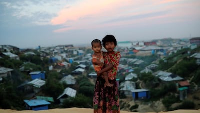 Rohingya refugee children pose for a picture at the Balukhali camp in Cox's Bazar, Bangladesh. Reuters