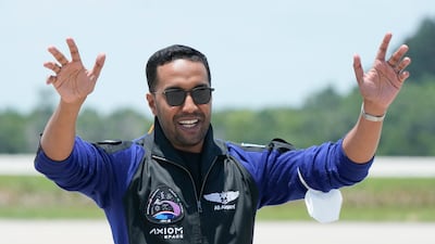 Saudi astronaut Ali Al Qarni waves to family and friends as he arrives at the Kennedy Space Centre in Cape Canaveral, Florida, on May 21. AP