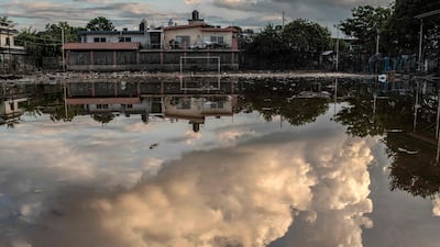 A puddle on a soccer field covered in water and mud caused by heavy rains in the Las Granjas neighbourhood in Poza Rica, Veracruz state, Mexico. AFP