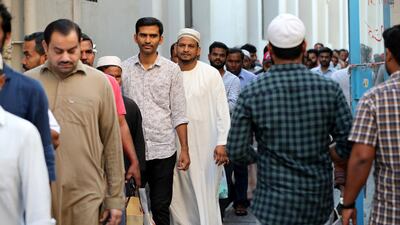 Crowds of worshippers prepare to break their fast at iftar.