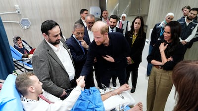 The Duke and Duchess of Sussex meet another Gazan, 17-year-old Jaber, who has shattered legs. All photos from here: PA