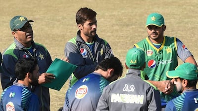 Mohammad Amir, centre, has been included in the ODI and T20 squads for Pakistan's tour of New Zealand. Arif Ali / AFP