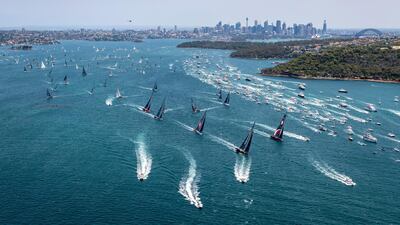 Competitors and the spectator fleet, right, race along at start of the 75th Sydney Hobart Yacht Race on Thursday, December 26. AP