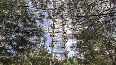 A tour group visits the site of the Duga Radar. Bloomberg