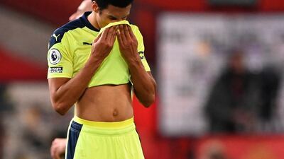 Newcastle's Isaac Hayden reacts after the defeat at Manchester United. EPA