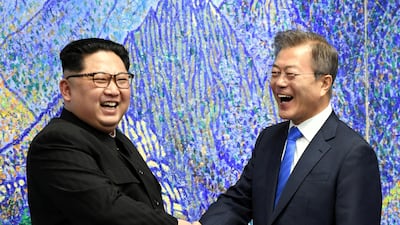 South Korean president Moon Jae-in, right, shakes hands with North Korean leader Kim Jong-un during their meeting at the Peace House at the truce village. Korea Summit Press Pool / Pool via Reuters