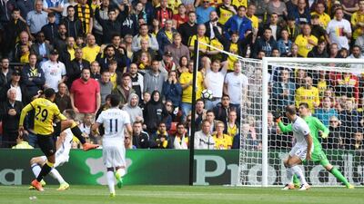 Etienne Capoue scores to give Watford the lead. Tony O’Brien / Reuters