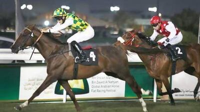 Harry Bentley displayed patience aboard Laamma, left, coming from behind to take first place in the Arabian Triple Crown Round 2 race at the Abu Dhabi Equestrian Club.