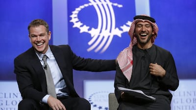 Actor Matt Damon laughs with Peyman Al Awadhi, the co-founder of Peeta Planet, while speaking at the Clinton Global Initiative in New YorkKevin Lamarque / Reuters