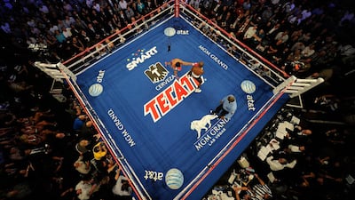 Manny Pacquiao punches Timothy Bradley in 2012. Getty