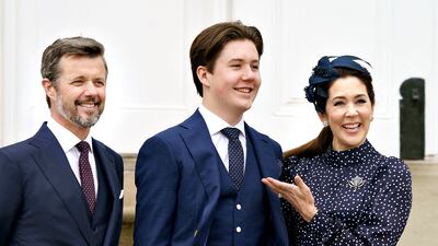 Crown Prince Frederik and Crown Princess Mary with their son, Prince Christian, at Fredensborg Castle Church, in 2021. AFP