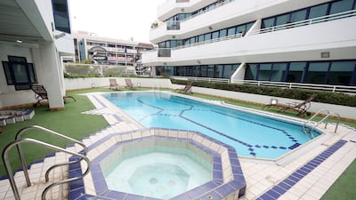 The swimming pool in the building.