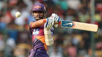 Rising Pune Supergiants batsman Ajinkya Rahane plays a shot during the 2016 Indian Premier League (IPL) Twenty20 cricket match between Royal Challengers Bangalore and Rising Pune SuperGiants, at The M Chinnaswamy Stadium in Bangalore on May 7, 2016. Manjunath Kiran / AFP