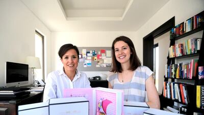 Michelle Lopez, right, and Catherine Stam with the personalised stationery and party invites they make for clients. Ravindranath K / The National
