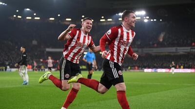 John Fleck, right, of Sheffield United celebrates after scoring. Getty