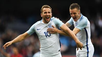 England strikers Harry Kane, left, and Jamie Vardy led the Premier League's goalscoring charts last season. Laurence Griffiths / Getty Images