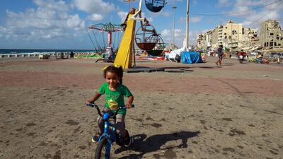 Libyans spend time on the waterfront promenade in the eastern port city of Benghazi. AFP