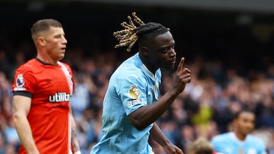 Manchester City's Jeremy Doku celebrates scoring their fourth goal. Reuters