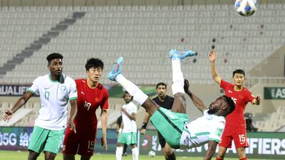 Saudi Arabia's Fahad Al Muwallad attempts an overhead kick. AFP