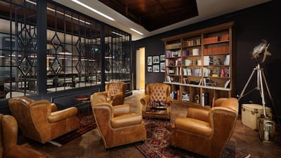 The cigar lounge immediately on entry is lifted straight from a London gentleman’s club at the height of empire – all brown leather, dark wood and dusty bookshelves. Courtesy Alfie’s / Jumeirah Emirates Towers Hotel