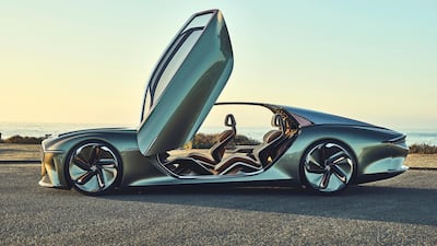 The EXP 100 shows off its gullwing doors.