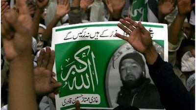 Supporters of the Jamat-e-Islami party agitate in Karachi this week for the release of Malik Mumtaz Qadri, who killed Salman Taseer, the governor of Punjab.