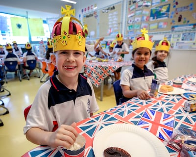 Repton School Abu Dhabi pupils prepare for the coronation. Victor Besa / The National