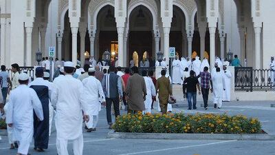 People arriving for the Eid prayers in Dubai. Pawan Singh / The National