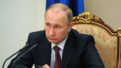 Russian President Vladimir Putin doesn't seem to bothered about the fact that social media is changing the nature of war reporting. Mikhail Klimentyev / AP