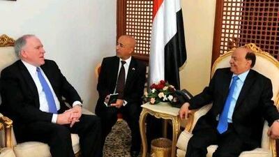 The US counterterrorism chief, John Brennan, left, conveyed a message of thanks from the US president, Barack Obama, to the Yemeni president, Abdrabu Mansur Hadi, right, for his antiterrorism measures.
