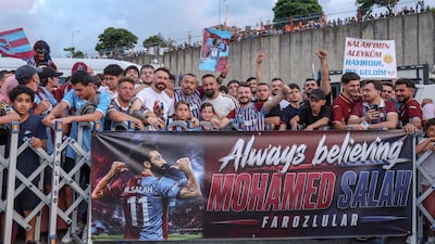 Fans wait at Trabzon Airport. AFP