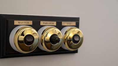 Vintage switches are seen inside a Palm Court Suite at the Raffles Hotel. Bloomberg