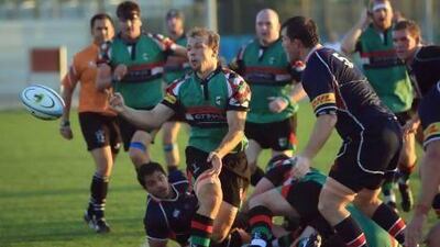 Abu Dhabi Harlequins, in green, topped the Jebel Ali Dragons 17-5, on February 15, and they meet again in today’s West Asia final. Ravindranath K / The National