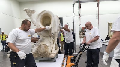 The scultpure is slowly moved into place in Gallery 8 that examines the magnificence of court. Christopher Pike / The National