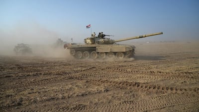 Iraqi security forces take part in an operation against ISIL at Al Shura area, south of Mosul. Reuters