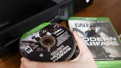 Games such as 'Call of Duty' might be held back by Microsoft for Sony PlayStation and other consoles. Bloomberg