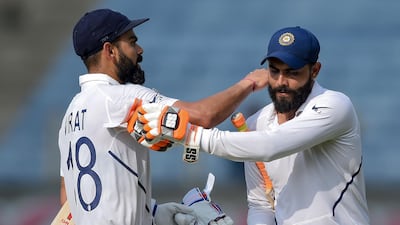 India's captain Virat Kohli, left, and Ravindra Jadeja after declaring on 601-5. AFP