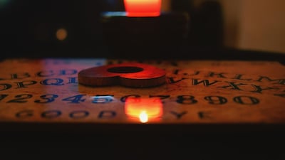 The characters in this book perform seances for the desperate and vulnerable. Getty