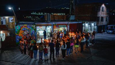 People gather for a peace and unity vigil in the Petare neighbourhood of Caracas, Venezuela, after opponents of President Nicolas Maduro disputed his re-election. AFP