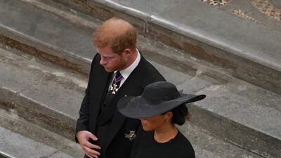 For most events surrounding the funeral, Prince Harry was in civilian garb rather than military uniforms. Getty Images