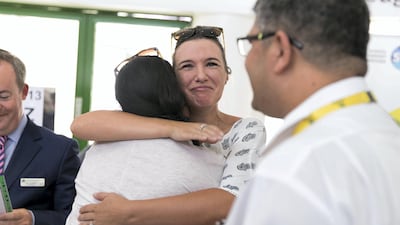 DUBAI, UNITED ARAB EMIRATES - AUG 17: A student reacts to receiving her A-level examination results at Jumeirah College School . (Photo by Reem Mohammed/The National) Reporter: Caline Malek Section: NA