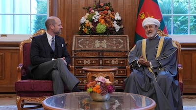Prince William, Prince of Wales, speaks to Sultan Haitham at the Sultan's residence in London. AFP