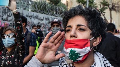 Lebanese protesters shout slogans at the governor of the Lebanese Central Bank, Ryad Salameh, during a protest in Beirut. EPA