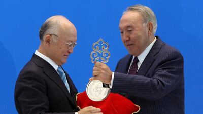 International Atomic Energy Agency (IAEA) Director General Yukiya Amano (L) and Kazakh President Nursultan Nazarbayev take part in a video link, dedicated to the opening of the Low Enriched Uranium (LEU) Bank in the Kazakh city of Oskemen, in Astana, Kazakhstan August 29, 2017. REUTERS/Mukhtar Kholdorbekov